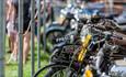 Isle of Wight, Events, Isle of Wight Steam Railway, Festival of Transport, image of line up of old motobikes
