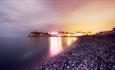 Lights shining over Freshwater Bay Beach, Isle of Wight, Things to Do