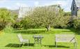 Outside garden area with benches at Gotten Manor Estate, Self catering, Isle of Wight