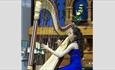 Isle of Wight, Harp on Wight International, Music, concerts, single harpist in blue dress playing
