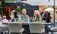 Isle of Wight, IW Homes & Interiors Show, East Afton Farmhouse, Visitors enjoying the Autumn sunshine