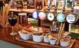 Variety of beers on tap and food platter at The Lifeboat, East Cowes, local produce, let's buy local