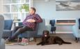 Man and dog in the lounge area, Luccombe Manor, Shanklin, Isle of Wight, Hotel, seaside location, sea view