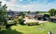Aerial view of Middle Barn Farm with rolling countryside, self-catering, Isle of Wight
