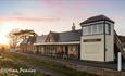 Sunset, outside view of Off The Rails Yarmouth, Isle of Wight, restaurant