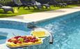 Fruit platter on the side of the outdoor swimming pool, Luccombe Manor, Shanklin, Isle of Wight, Hotel, seaside location, sea view