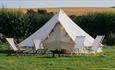 Deck chairs and fire outside bell tent, Island Bell Tents, glamping, self catering, Isle of Wight