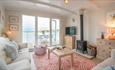 Living area that opens onto balcony with outside eating and sea view at Oyster Catcher, Classic Cottages, Isle of Wight, self catering, accommodation