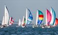 Yachts racing in the Round the Island Race, Isle of Wight, What's On - Image credit: Paul Wyeth