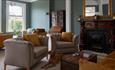 Dog lying in the lounge area at Sentry Mead, Totland, Isle of Wight, coastal B&B, accommodation