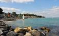 Yacht sailing in the distance at Seagrove Bay beach, Isle of Wight, Things to Do