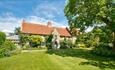 Outside view of Shalfleet Manor from garden, self-catering, Isle of Wight