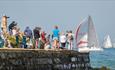 Spectators in Cowes watching the Round the Island Race, Isle of Wight, What's On - Image credit: Paul Wyeth