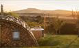 Outside view of Modulog with hot tub at Tapnell Farm, Isle of Wight, glamping, self catering - image credit: Skarsgard