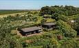 Aerial view of Wood Cabins at Tom's Eco Lodge, Tapnell Farm Holiday Destination, self-catering, West Wight, Isle of Wight