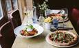 Pizza, salad, fries and wine at The Coast Bar & Dining Room, Cowes, Eat & Drink - Copyright: Maria Bell