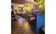 Isle of Wight, Eating Out, The Garden, Cowes, Inside seating with neon sign