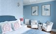 Isle of Wight, Accommodation, The Osborne Guesthouse, Shanklin, Blue Double Room with pictures of Cranes (Birds) on wall above seating area