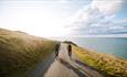 Tim Wiggins riding on the Isle of Wight, Joyride Festival, cycling, wellness, health & wellbeing, food, music, what's on, event