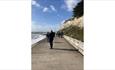 A group of walkers standing on the walkway along Ventnor beach, Isle of Wight Spring Walking Festival, event, what's on