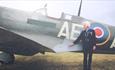 Mary Ellis standing next to a spitfire, Wight Aviation Museum, Sandown, attraction, Isle of Wight history