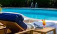Sunbed next to the outside swimming pool within the grounds of The Royal Hotel, Ventnor, Isle of Wight, luxury, place to stay