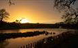 Isle of Wight, Wedding Venue, Westover Farm, Calbourne, sun setting behind lake