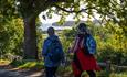 Two ladies walking towards the coast on the Isle of Wight, Isle of Wight Walking Festival, Spring event, Autumn event, what's on, things to do