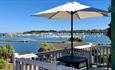 Dining area on balcony with harbour views, Old Mill Holiday Park, St Helens, Isle of Wight