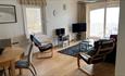 Dining and living area at Beach View Apartment, Ventnor, Isle of Wight, Self-catering