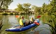 Kayaks on lake at The Lakes Rookley Holiday Resort, Isle of Wight, Self Catering