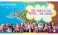 Group of children with the map of the Isle of Wight in the background, school trips, Isle of Wight, Education Destination