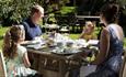 Family enjoying an afternoon tea in the garden at The Royal Hotel, Mother's Day event, what's on, family, Ventnor, Isle of Wight