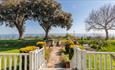 View of garden with sea view at Old Vicarage Garden Apartment, self catering, Shanklin, Isle of Wight