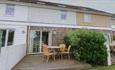Outdoor dining table and chairs on decking at Delaware, holiday cottage, self catering, Yarmouth, Isle of Wight