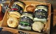 Variety of garlic mayonnaise with garlic in a basket at The Garlic Farm Shop, Isle of Wight, farm shop, local produce, let's buy local
