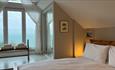 Bedroom with sea view at Gills Cliff House in Ventnor on the Isle of Wight, self catering