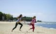 Girls running on Appley beach, Ryde, Isle of Wight, Things to Do