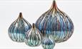 Selection of Isle of Wight Glass Blue Linear Onion Vases at at Isle of Wight Studio Glass, attraction, things to do, handmade, local