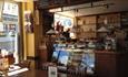 Counter, tables and chairs inside of Michelangelo restaurant, Ryde, Isle of Wight, Italian, eat & drink