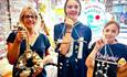 Family with their art creations, Island Craftworks, art workshop, family, children activities, adult activities, Isle of Wight
