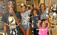 Family showing the crafts they've made at a craft workshop at Island CraftWorks, Ryde, Isle of Wight, family, children's activity, group, workshops