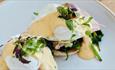 Eggs benedict dish at Isle of Wight Pearl with sea views, eat & drink
