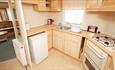 Kitchen area in caravan at Dinosaur Farm Holidays - Isle of Wight, Self-catering