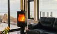 Woodburner in the living room with sea views, Island Holiday Homes, self catering, Isle of Wight