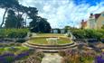 Maizie standing on the steps in the garden at Haven Hall Hotel, luxury, Shanklin, Isle of Wight