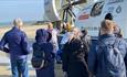 Group having a tour of the outside of the hovercraft, Hovertravel's Hovercraft Flight Experiences, things to do, tour, history, activities, Isle of Wi