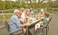 Outside eating area at The Lakes Rookley Holiday Resort, Isle of Wight, Self Catering