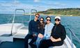 Group of people sitting on the catamaran, Ventnor Bay Charters, boat trip, activity, tour, Isle of Wight