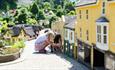 Child viewing the Old Shanklin Village miniature at the Model Village Godshill, Isle of Wight, Things to Do